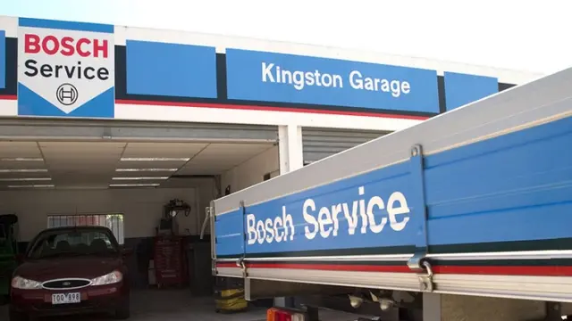 Skilled mechanics at Kingston Garage workshop, working to deliver excellent car service and maintenance.