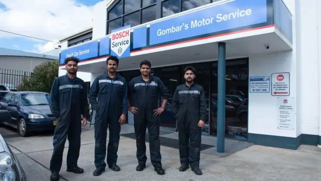 Team of mechanics in front of the workshop at Bosch Car Service Queanbeyan