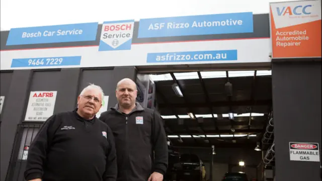 Dedicated team members of ASF Rizzo Service Station, standing proudly in front of the workshop, ready to deliver exceptional car services.